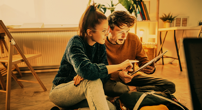 Couple looking at tablet