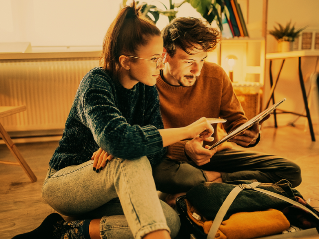 Couple looking at tablet