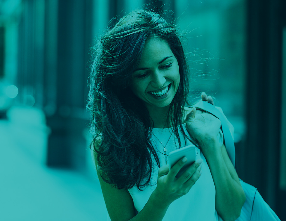 Woman on the go engaged with phone