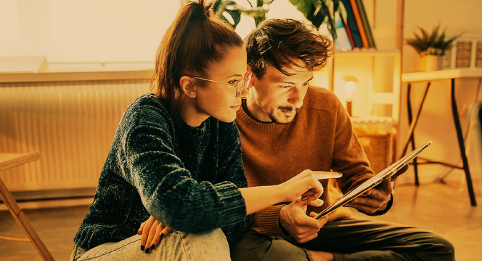 Couple looking at tablet